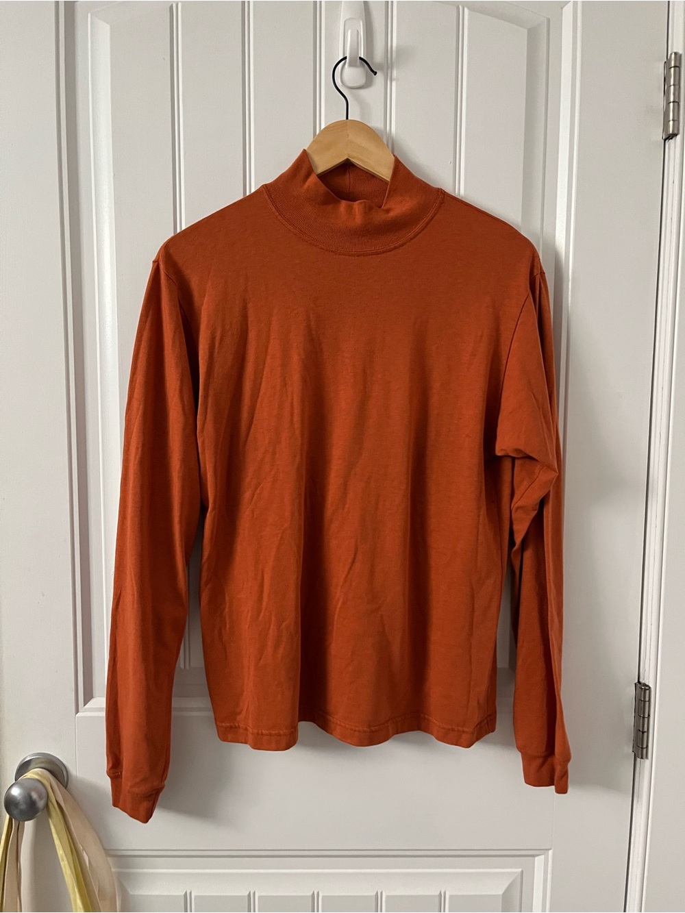 Orange turtleneck